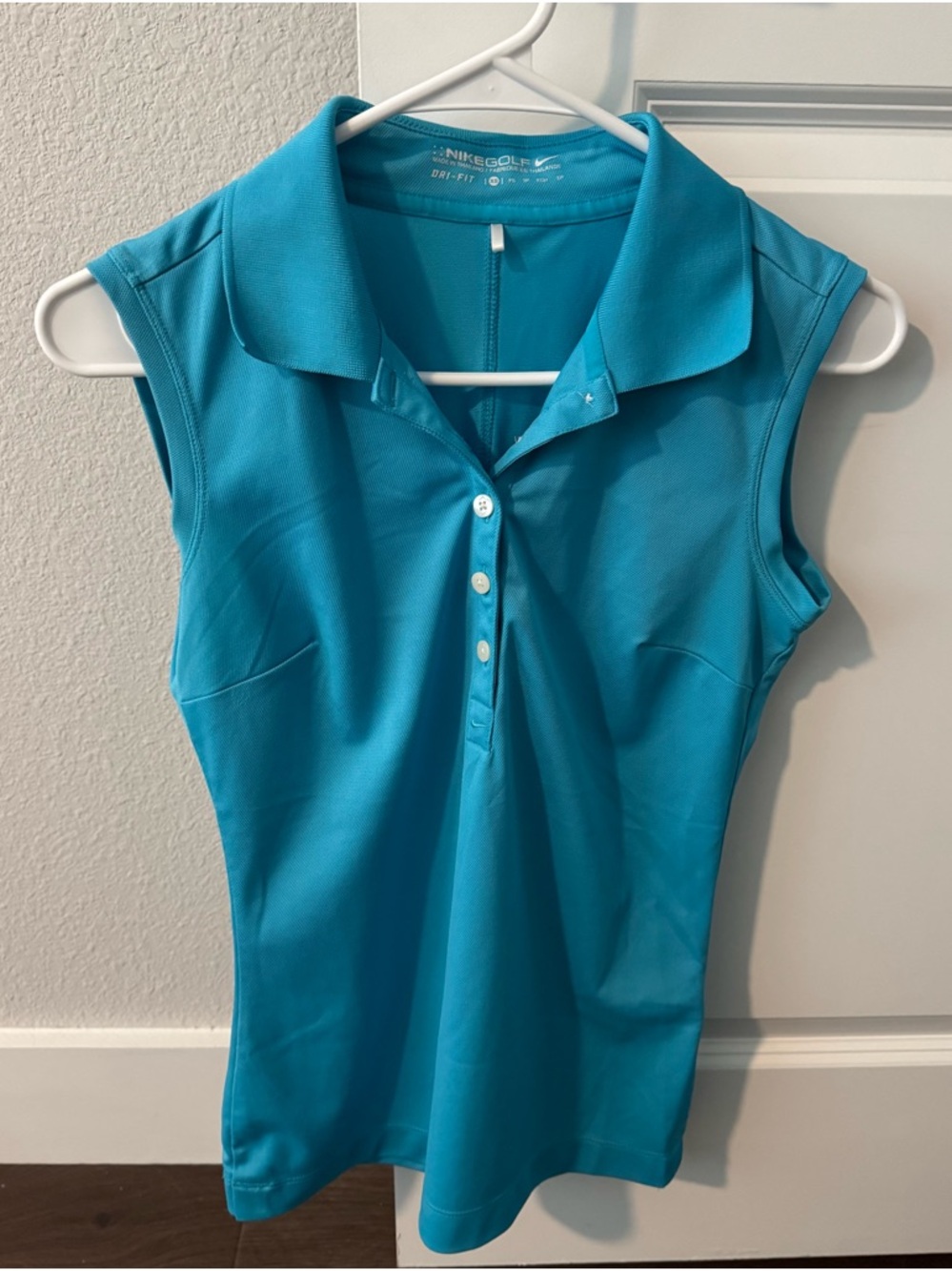 Nike Dri Fit Women's Sleeveless Golf Shirt - Aqua Blue